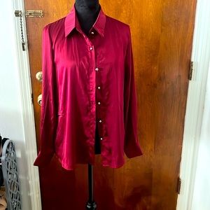 Burgundy button up shirt.